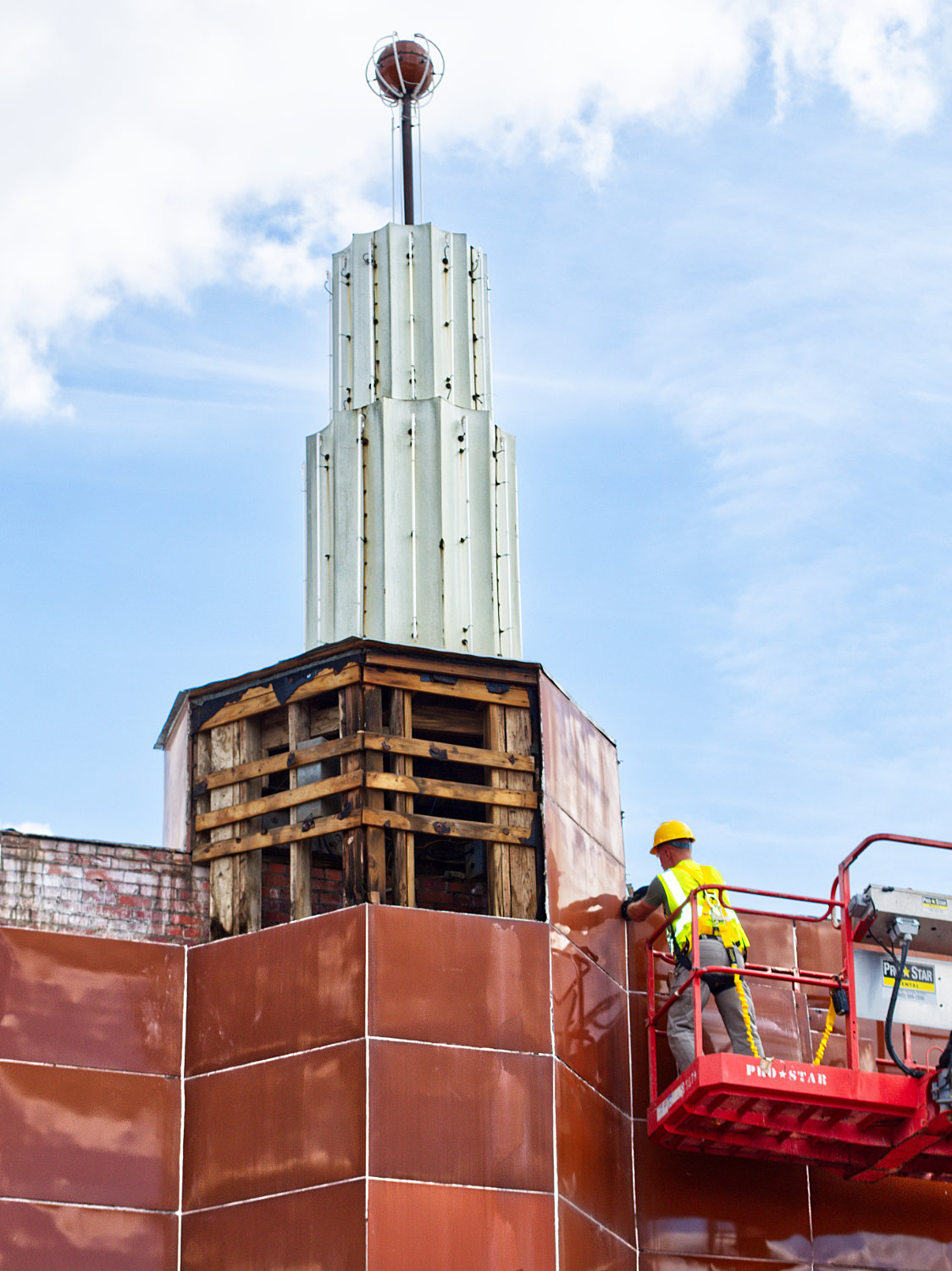 Repairs to the iconic neon tower at the historic Select theater in downtown Mineola got underway last week. The lumber in the substructure is being replaced to stabilize the tower, which was in danger of collapsing.